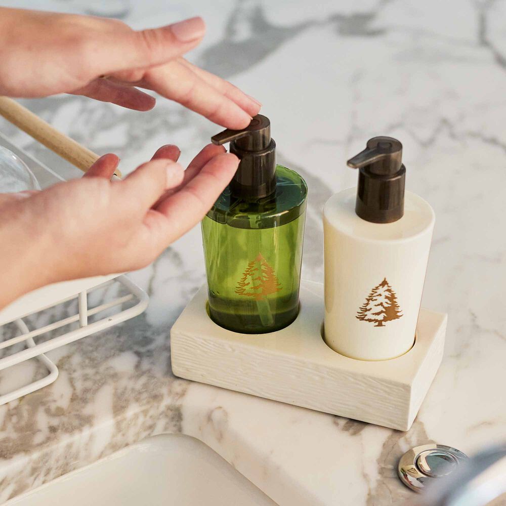 Thymes Frasier Fir Hand Lotion In Use image number 2